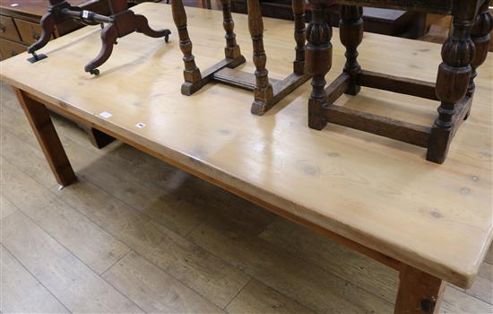 A modern pine kitchen dining table, W.225cm